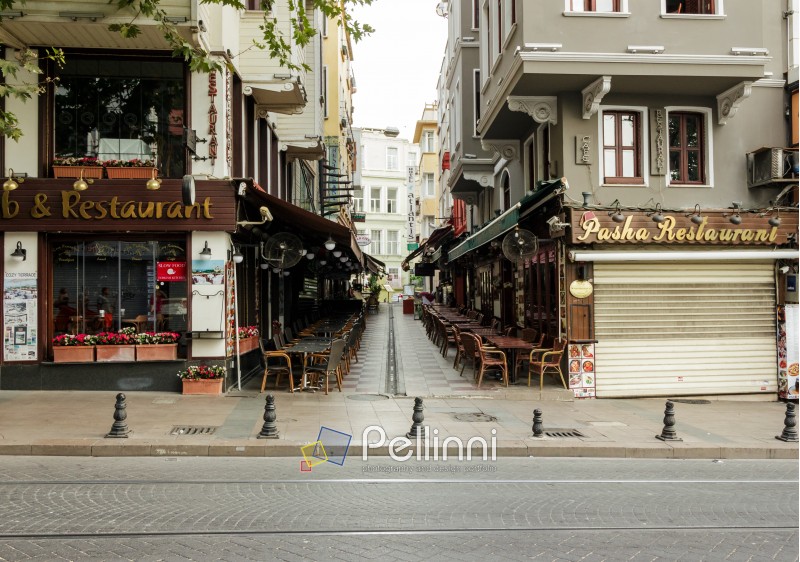 ISTANBUL - AUGUST 18: Divan Yolu street on August 18, 2015 in Istanbul. Turkish restaurants on Divan Yolu and  Bestekar Osman street near Sultanahmet Square  in Istanbul