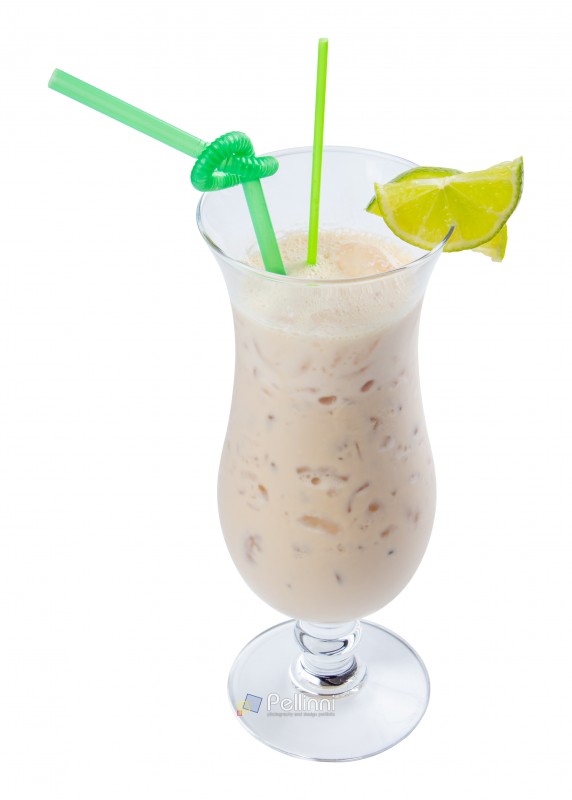 apple smoothie decorated with lime. refreshing drink in tall glass with ice and green straw