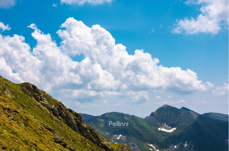 beautiful cloudscape over the Fagaras mountains. Bright sunny day in Romania. beautiful nature background