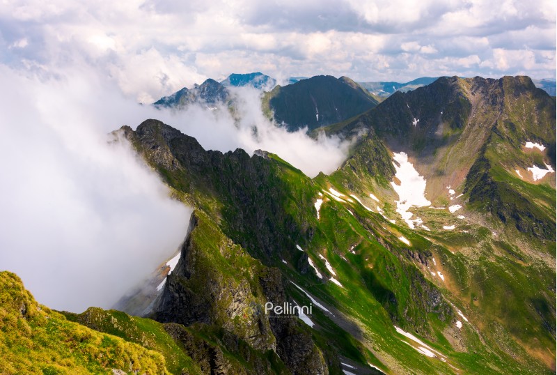 clouds rising in Fagaras mountains. beautiful summer scenery of Southern Carpathians