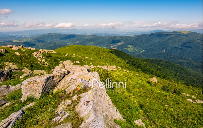 huge boulders on the edge of hillside. fine weather in summer mountain landscape