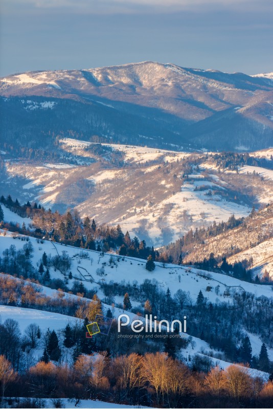 mountainous rural area of Carpathians in winter on fresh frosty morning