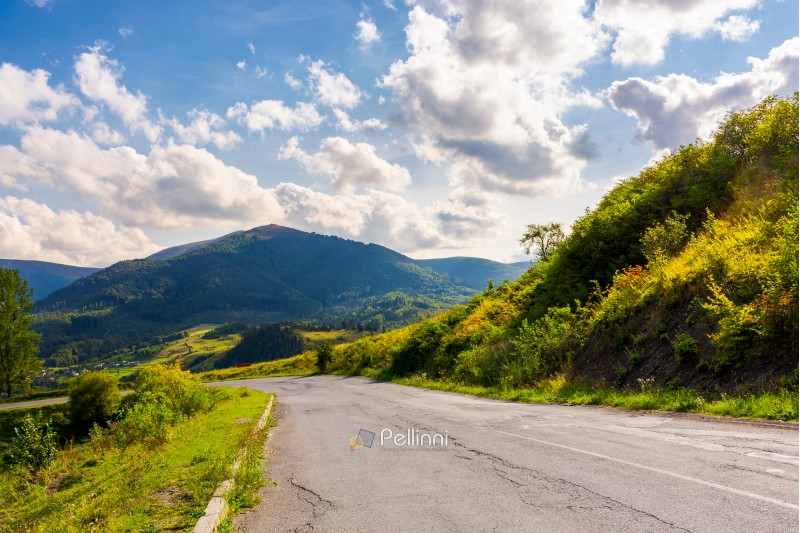 old serpentine road in to the mountains. beautiful nature scenery in mountainous area. lovely transportation background.