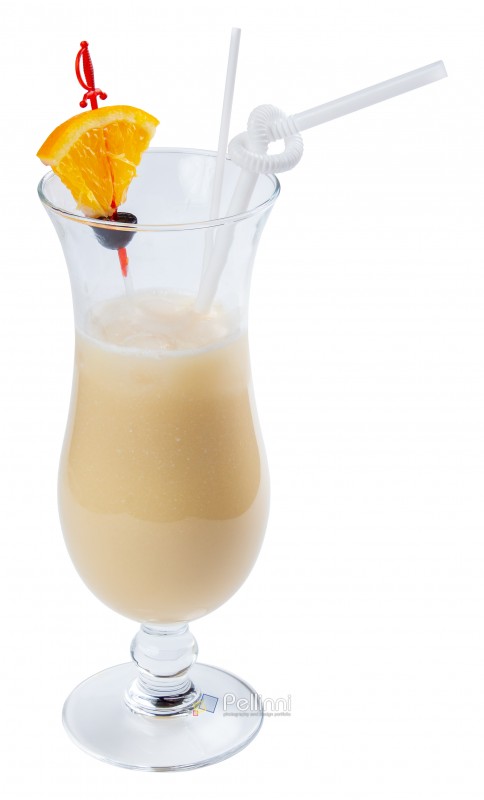pina colada alcohol cocktail with orange and olive in a tall glass. isolated on a white background