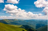 Carpathian mountain ridge with its spurs under sky with clouds. beautiful summer nature scenery