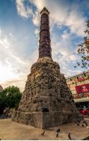 ISTANBUL, TURKEY - AUGUST 18, 2015: Column of Constantine the most important examples of Roman art in Istanbul. Old monument is located along Divan Yolu street that leads to Sultanahmet Square