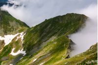 mountainous landscape on a cloudy summer day. beautiful nature scenery on high altitude. Fagaras mountains, Romania