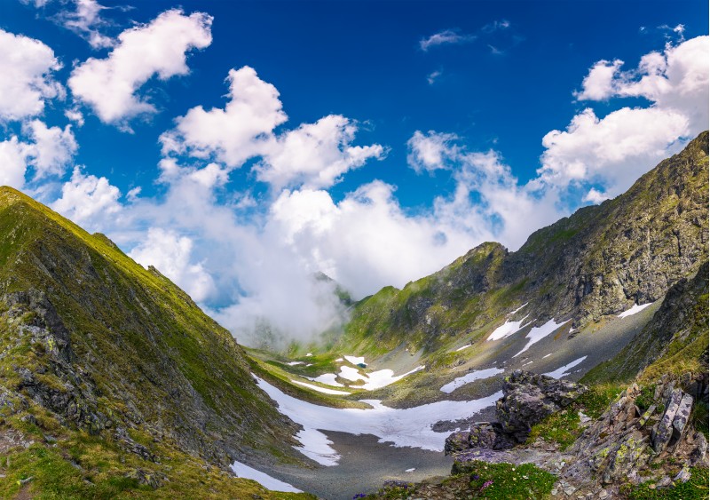 beautiful cloud formation over the gorgeous ridge. lovely summer scenery in mountains. Location Fagarasan mountains, Romania