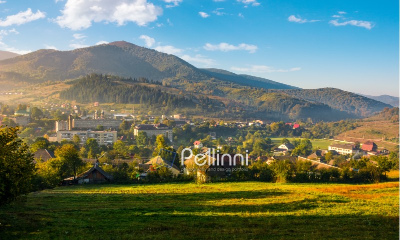 beautiful countryside of TransCarpathian town Volovets. spectacular early autumn scenery in mountains at sunrise