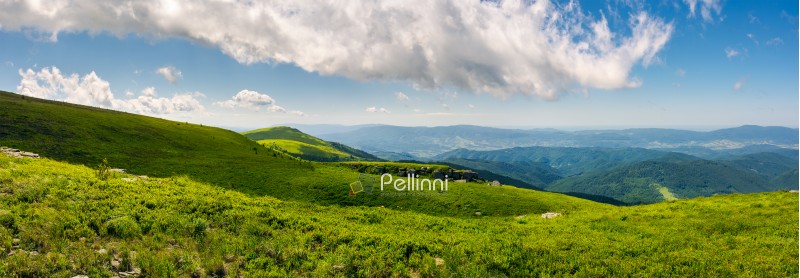 beautiful panorama of Runa mountain hills. wonderful cloudscape on a blue sky over the distant mountain range. breathtaking view of mountainous summer landscape in Carpathians