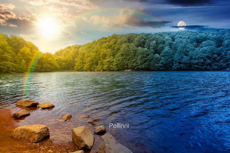 beautiful view of landscape with lake. day and night time change beautiful view of landscape with lake. day and night time change concept. body of water among beech forest in mountains with sun and moon at twilight. harmony and progress calendar
