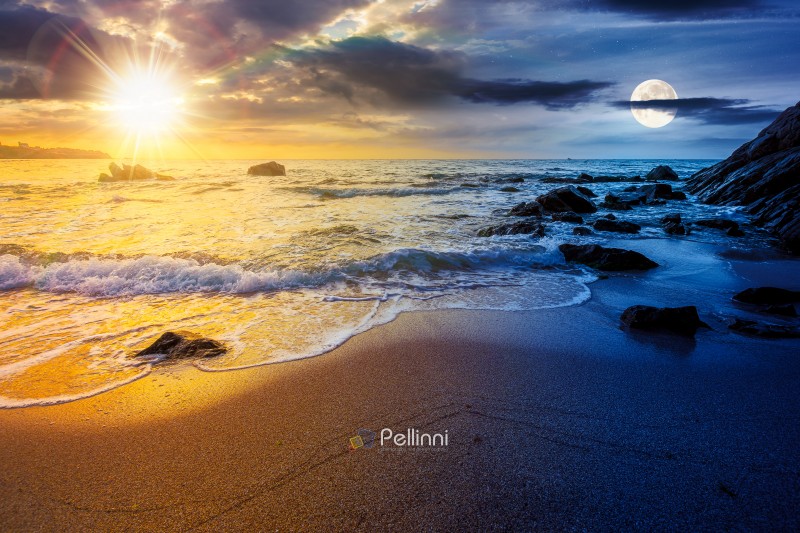 empty sandy beach at the sea. day and night time change concept. empty sandy beach at the sea. day and night time change concept. white foam rolling on to the shore near boulder with sun and moon at twilight. perfect summer vacation concept. astrology wallpaper