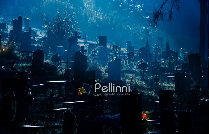 foggy dark night on cemetery. orthodox Halloween concept background 