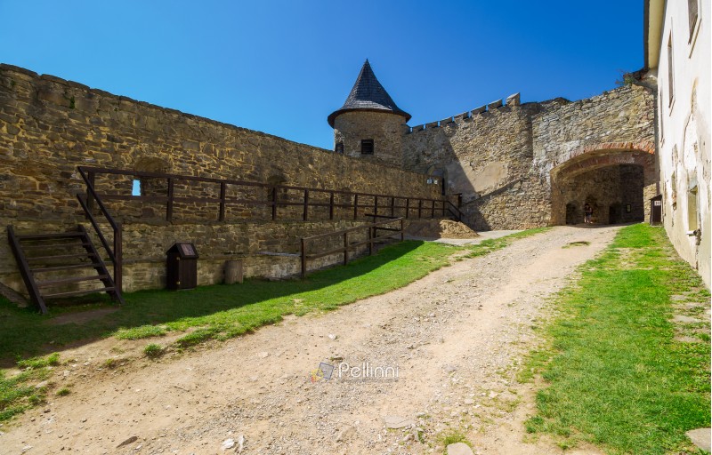 Stara Lubovna, Slovakia - AUG 28, 2016: inner courtyard of old medieval castle. tower and entrance in to the castle. popular tourist destination