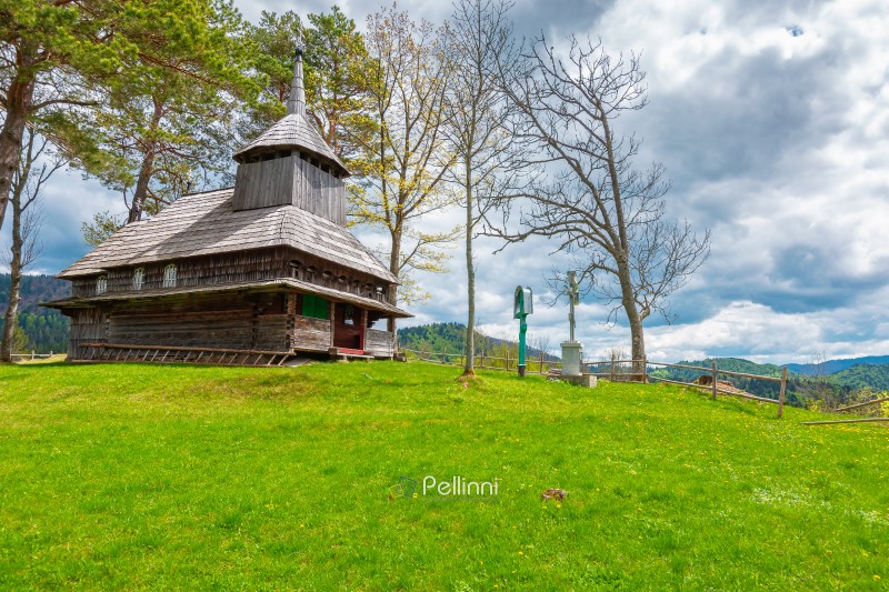 kuzhbeyi, ukraine - 12 may 2019: church on a hill in abandoned village of transcarpathia region, mizhhirya rural district. view of lemko old wooden architecture heritage