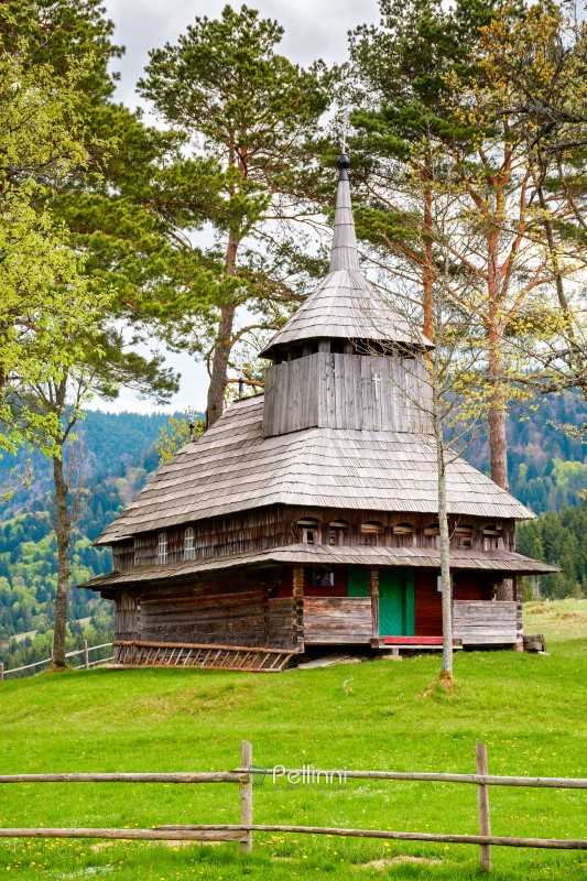 kuzhbeyi, ukraine - 12 may 2019: old wooden church on a hill in abandoned village of transcarpathia region, mizhhirya district. historic lemko architecture heritage