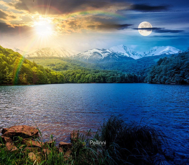 mountain lake on spring equinox. day and night time change concept. composite landscape of lake and ridge with sun and moon. calm water, green forest and snow capped peaks. equality and shift template