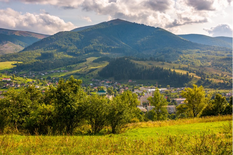 outskirts of Carpathian town Volovets. lovely countryside scenery in mountainous area with forested hills and cloudy sky