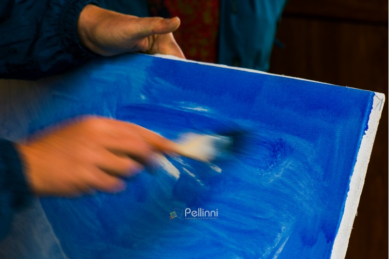 painter prepare canvas for drawing. beautiful artistic background. hand motion blur, speed drawing concept