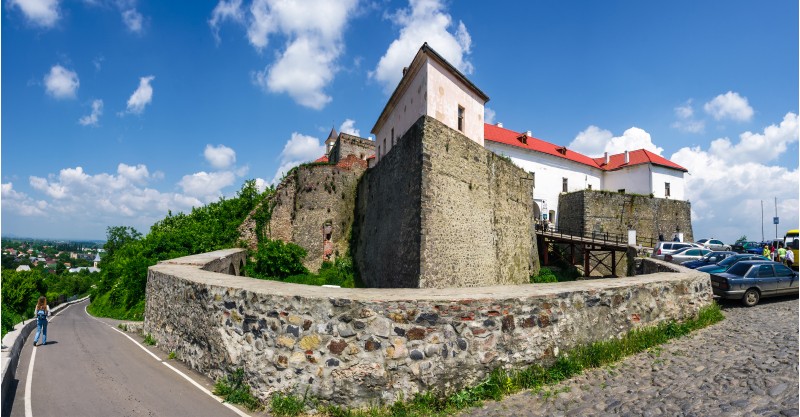 Mukachevo, Ukraine - MAY 25, 2008: panorama of Palanok Castle in summertime. Old fortification now serves as the museum and is popular tourist landmark