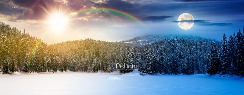 panorama of beautiful mountainous landscape in winter. day and night time change concept. spruce forest around the snow covered lake with sun and moon. cold weather. harmony and progress calendar