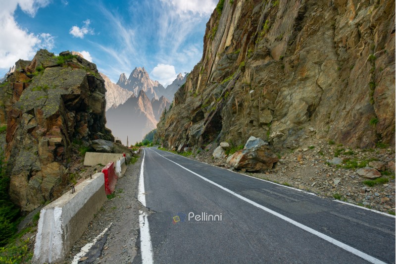 road in to the high mountains between rocky cliff. composite image of dangerous path to the dreams. 