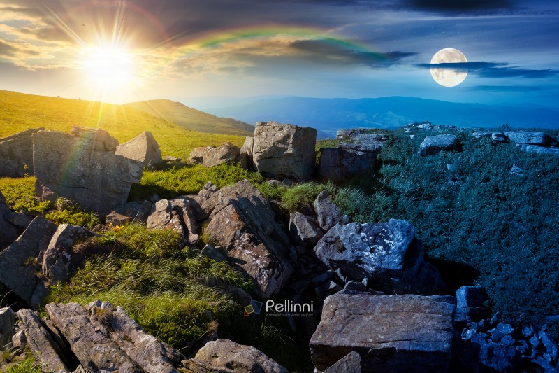rocks on alps in mountains. wonderful travel landscape in summer. day and night time change concept. scenic view with sandstone among grass on the hill. alpine scenery with sun and moon at twilight