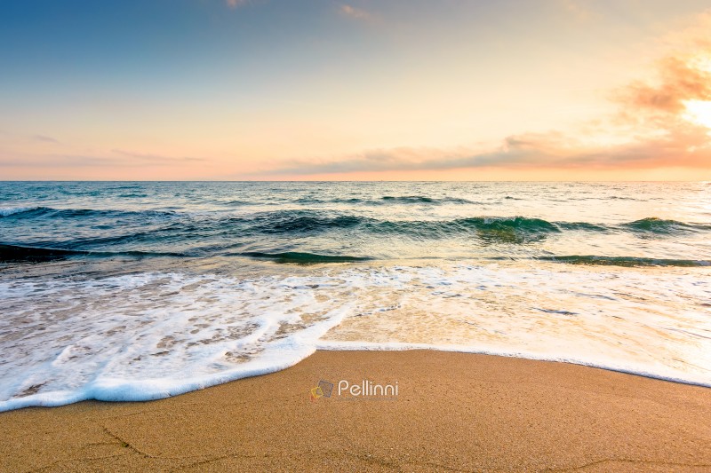 sand beach at the sea for summer vacation concept. beautiful sunrise at perfect bulgaria coast with calm waves and clouds on sky. beautiful morning landscape for holiday and travel background