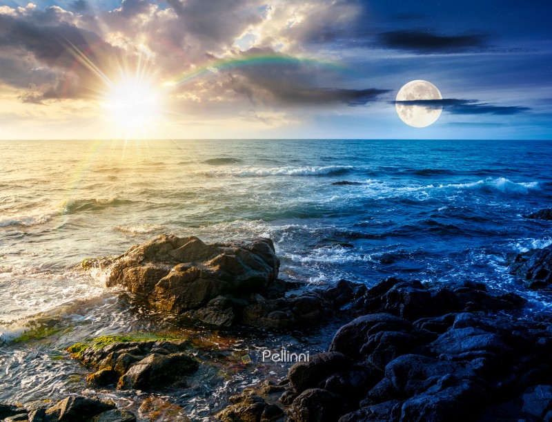 sea coast with rocks and boulders. day and night time change concept. calm summer vacation background at the seashore. wonderful scene for relax and leisure at the seaside with sun and moon