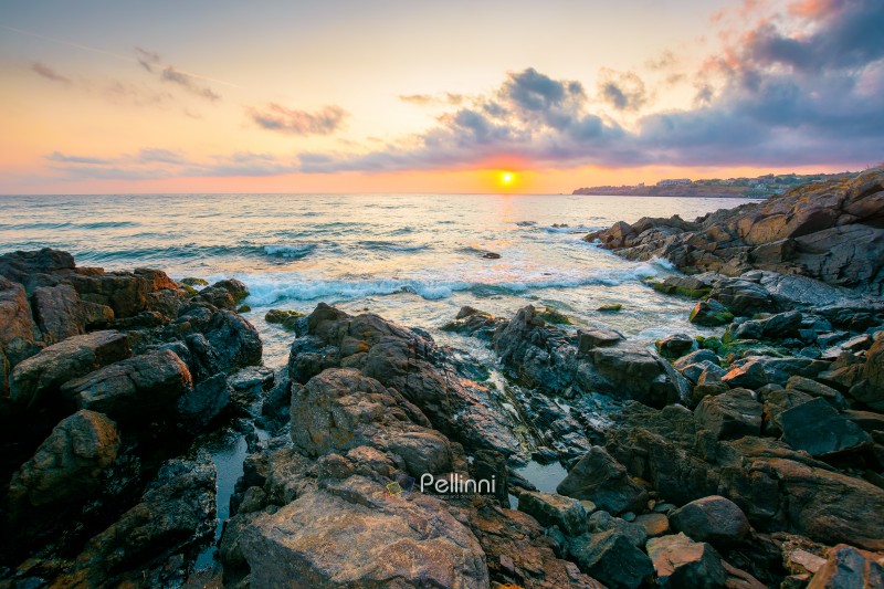 sea landscape at sunrise. rocky coast of bulgaria in summer. dramatic travel background with epic sky