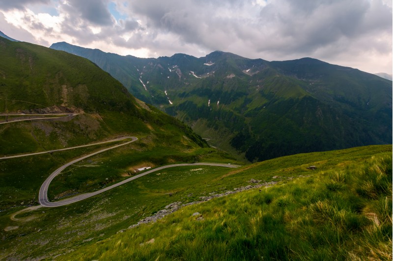 serpentine of Transfagaras down the hill. lovely transportation scenery on a cloudy day