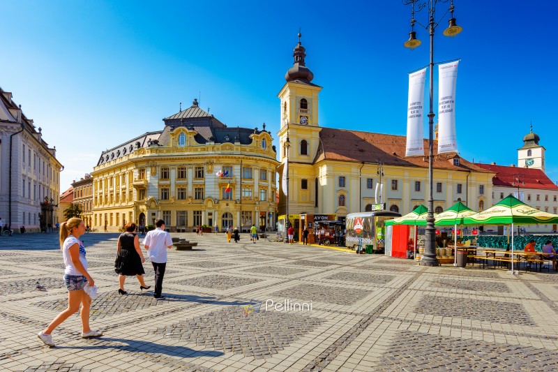 sibiu, romania - jun 25, 2017: romania cityscape with square and tower. travel landmark of transylvania. sibiu city known as hermannstadt is a medieval heritage of europe for tourism.