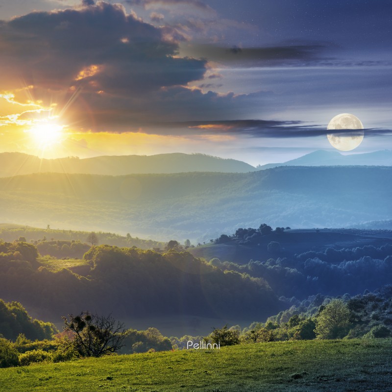 day and night time change concept above romania countryside with green rolling hills beneath a moon and sun. agricultural grassy field. mountain ridge in the distance. cloudy sky.