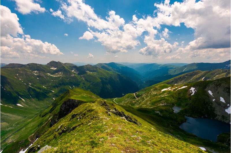 view from Saua Vaiuga in to the Valley of Fagaras. beautiful summer landscape of Southern Carpathian mountains, Romania