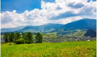 beautiful countryside of TransCarpathian town Volovets. spectacular early autumn scenery in mountains at sunrise