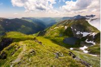 beautiful landscape of Romanian mountains. lovely summer scenery on a cloudy day. Lake Capra down the hillside