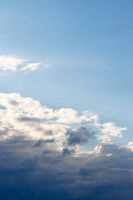 blue sky with cumulus clouds in summer. cloudy weather in the afternoon. meteorology forecast background for wind and cloudiness atmosphere conditions