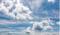 cloudy dynamic formation on a blue summer sky. dramatic weather background with beautiful cloud arrangement