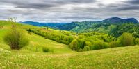 panorama of countryside in mountain on a cloudy day. beautiful landscape in springtime