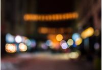 defocused background of city lights on street. lovely winter holidays concept. 