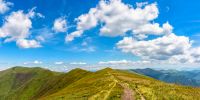 panoramic summer landscape with hillside meadow in Carpathian mountains