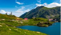 Transfagarasan road, Romania - Jun 26, 2017: lake Balea in Fagaras mountains on a bright sunny day. amazing summer landscape of one of the most visited landmarks in Romania