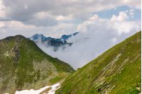 mountainous landscape on a cloudy summer day. beautiful nature scenery on high altitude. Capra peak, Fagaras mountains, Romania