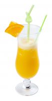 orange juice in tall glass. fresh drink with ice decorated with fruit slice and straw