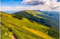 summer mountain landscape. path through the ridge to the top peak