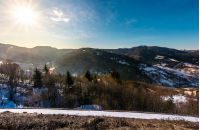 sunny day in Carpathian mountains. lovely winter landscape with small amount of snow