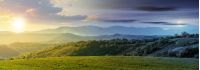 day and night time change above panorama of romania countryside. wonderful springtime landscape in mountains with sun and moon. grassy field and rolling hills. rural scenery